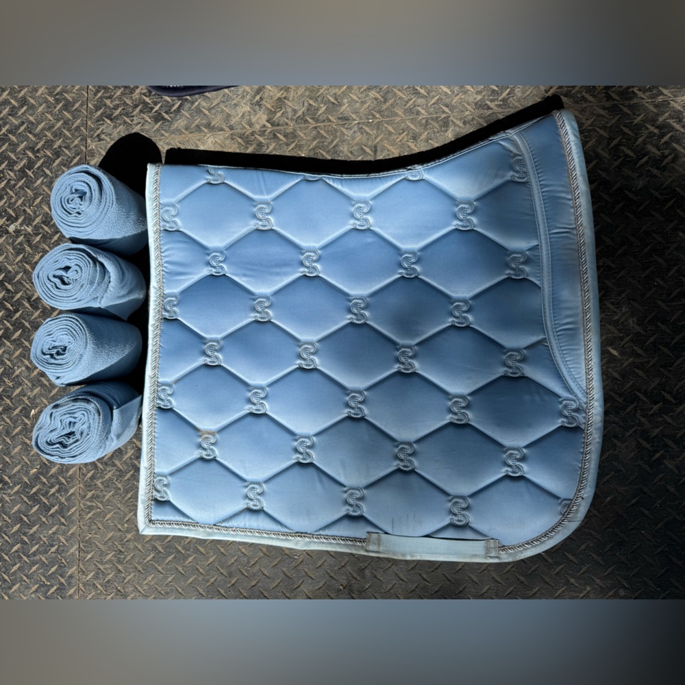 Lot of matching dressage pads with polos